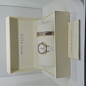 Anne Klein Women's 12/2248WTST Swarovski Crystal Accented White Bangle Watch